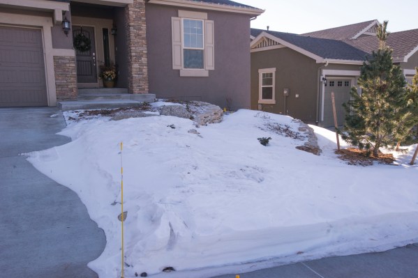 Snow covered yard_NSFT_COS_LAH_9310